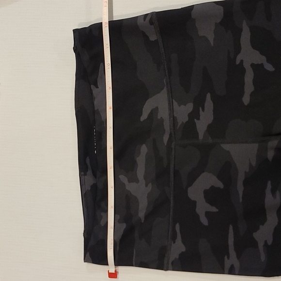 Practically brand new!  Athleta Ultimate 7/8 tights in black camo print. Size XS - Picture 3 of 9